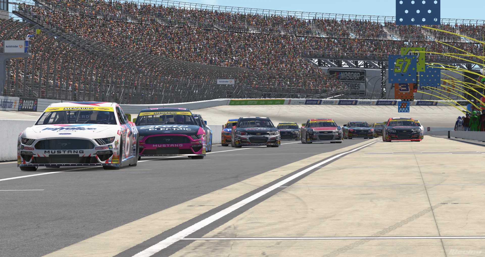 The entire field finds their way onto pit road during the sole caution of the day. Photo credit: Chuck Burley